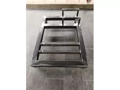 Overall view of welded steel base frame with integrated support structure and mounting crossmembers..jpg